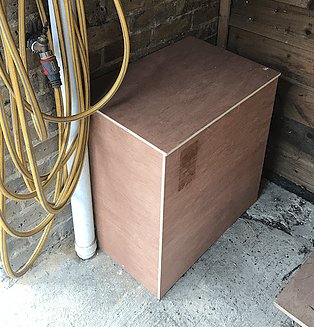 A plywood insulated outside cabinet